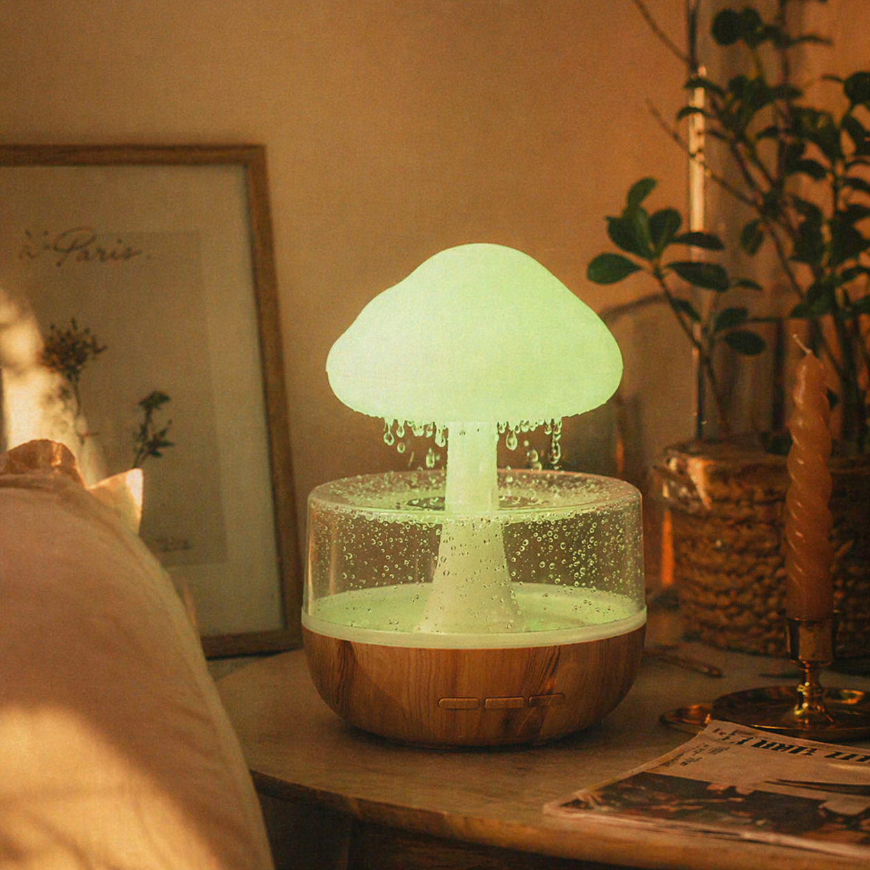 Nimbus Rain Hub at night with warm mood lighting on bedside shelf